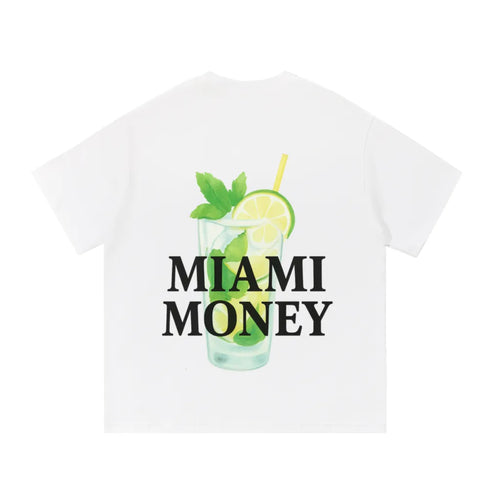 Miami Money white t-shirt featuring a bold black “MIAMI MONEY” logo layered over a mint mojito cocktail illustration—clear glass with lime slices, fresh mint leaves, and a yellow straw—minimalist summer streetwear graphic on a clean white background.
